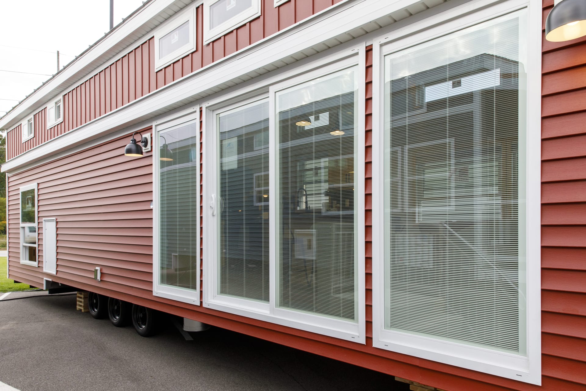 Manufactured Home Red Siding with Large Windows
